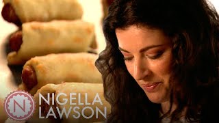 Nigella Lawsons Pigs in Blankets  Nigella Bites [upl. by Nairot]