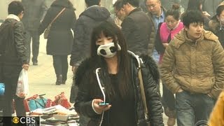 Chinas super smog Govt official calls Beijing pollution quotunbearablequot [upl. by Kennie]