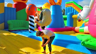 Worlds Largest Bounce House Game Of FLIP [upl. by Atikaj]