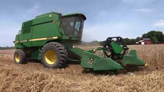 John Deere Combine Harvesting Triticale small grain [upl. by Nomis]