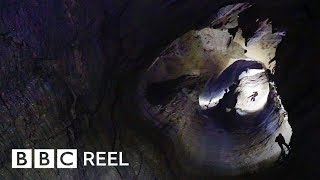 The daring journey inside the worlds deepest cave  BBC REEL [upl. by Ilujna]