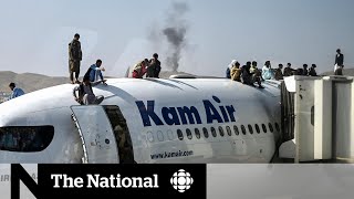 Desperate Afghans flock to Kabul airport in attempts to flee [upl. by Sanyu212]