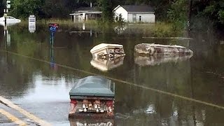 Eerie Coffins Seen Floating Through Flooded Louisiana Streets [upl. by Ahso]