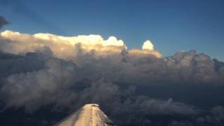 Flying Around A Thunderstorm  4K View From The Window Seat [upl. by Anattar579]