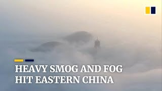 Heavy smog and fog in eastern China disrupts daily life [upl. by Euqirrne]